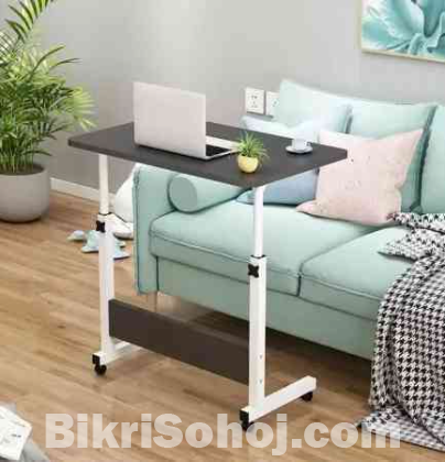 Adjustable and movable table